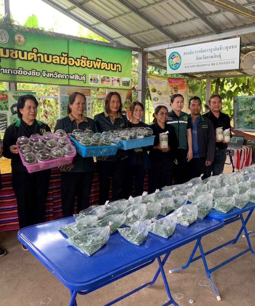 Staff displaying biocontrol products at a Crop Protection Management Centre in Thailand.